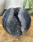 Banded Agate Sphere Geode with Quartz Crystal Cavity - SPH0151