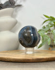Banded Agate Sphere Geode with Quartz Crystal Cavity - SPH0151